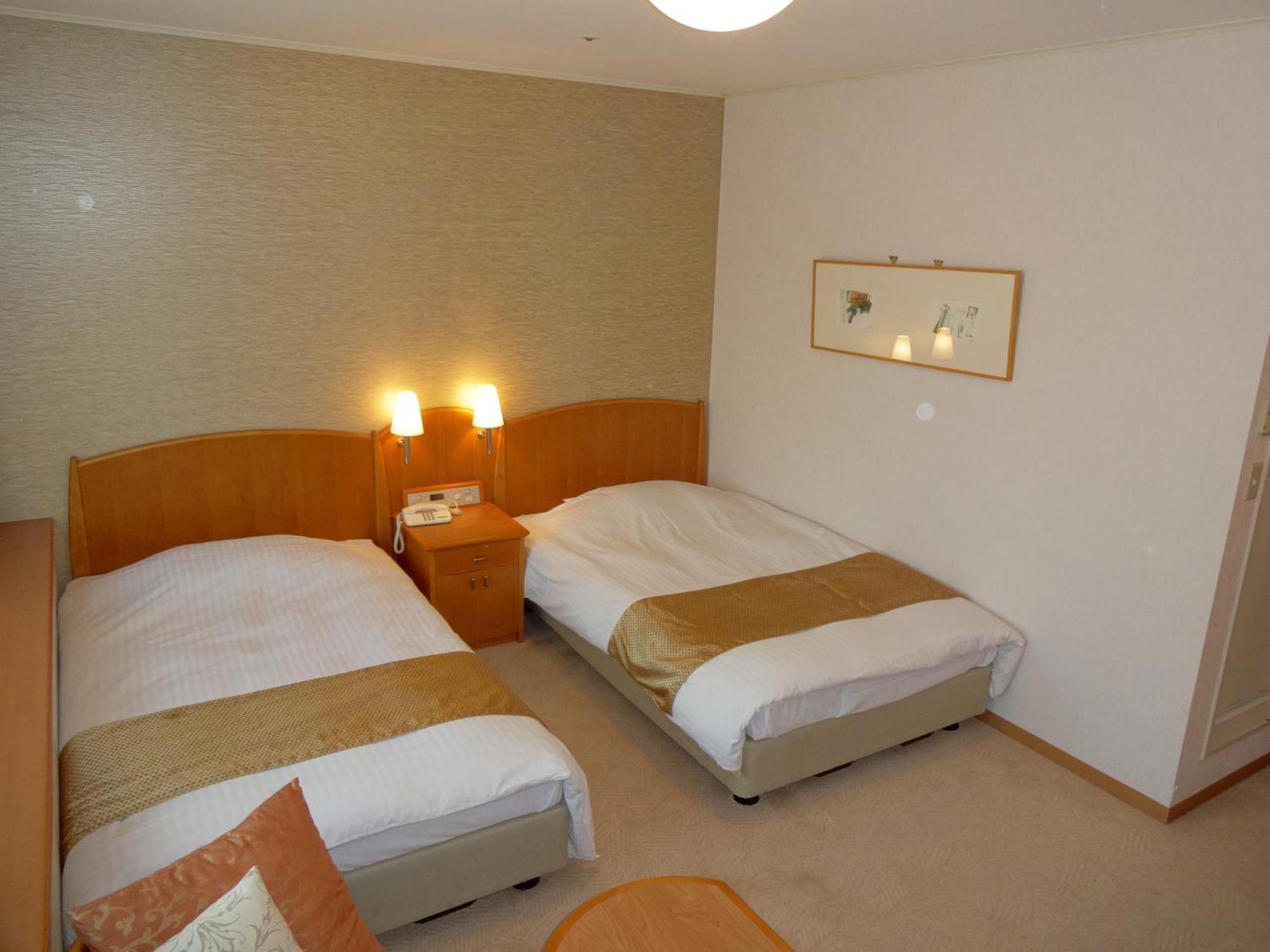 Kobe Luminous Hotel Quarto foto
