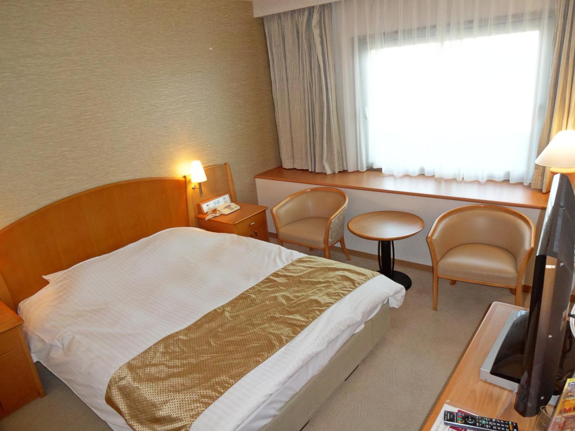 Kobe Luminous Hotel Quarto foto